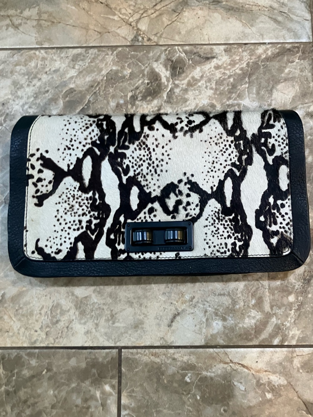 BCBGMAXAZRIA Sophia Snake Print Animal Hair Clutch